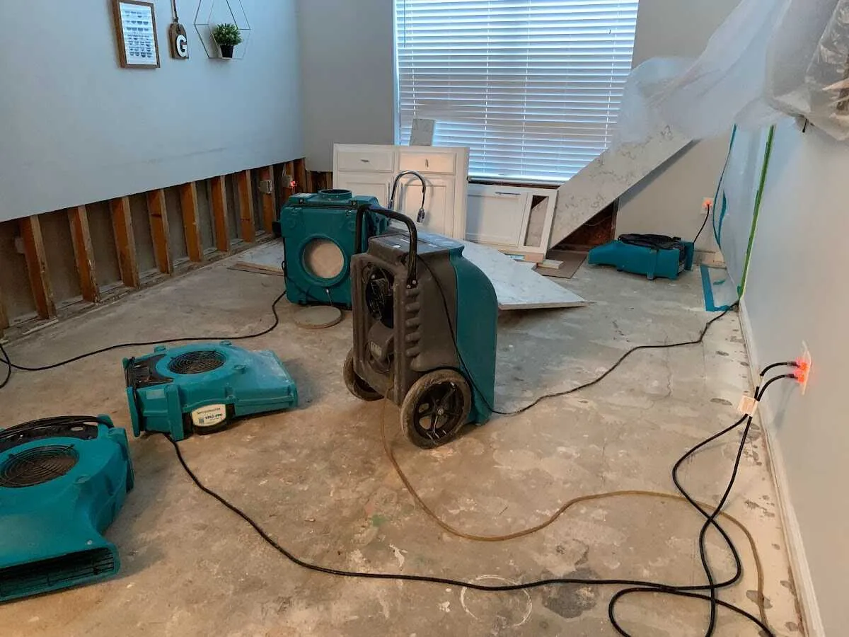 Dehumidifier in flood-cut room for Water Damage Restoration in Chapel Hill